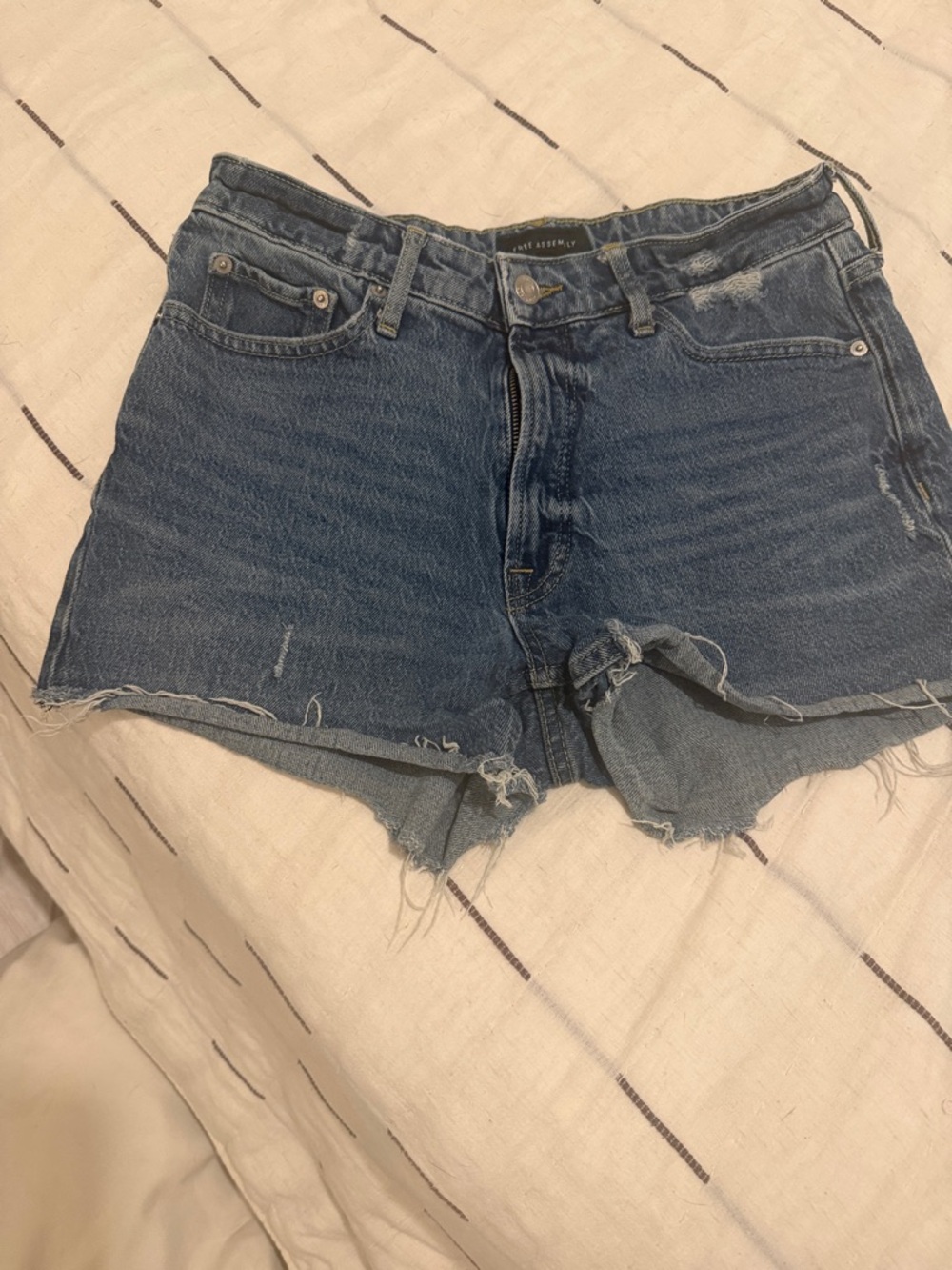 High-Waist Distressed Denim Shorts in Blue